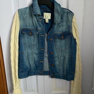 Denim jacket with sweater sleeve
